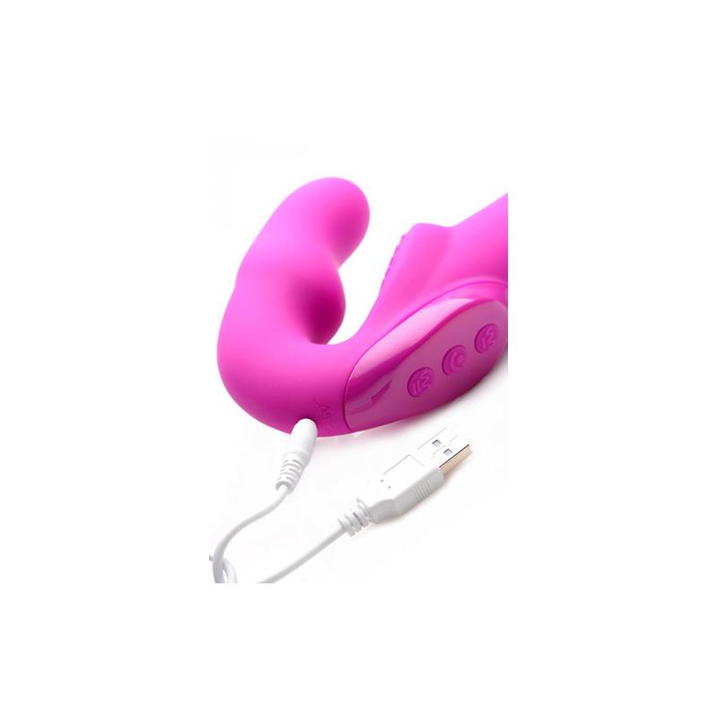 Evoke Vibrating Strap-On Pink in hand